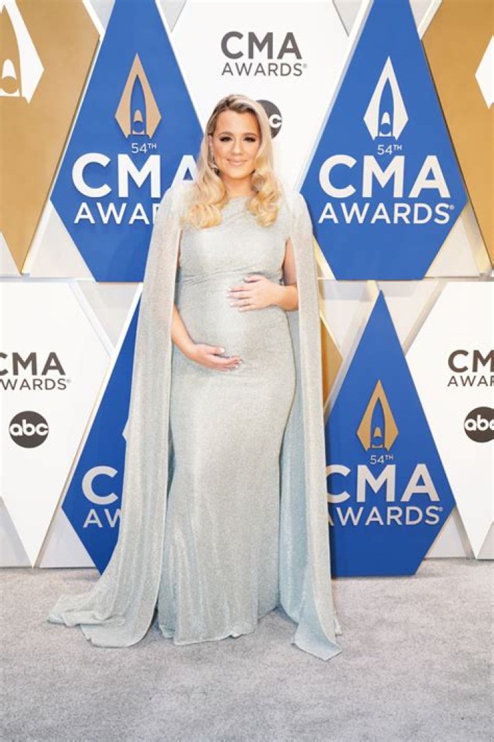 Shows Off Baby Bump In Silver Dress – Hollywood Life