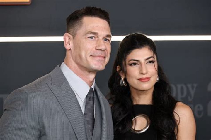 John Cena’s Wife Shay Shariatzadeh Sweetly Holds On To Him During Rare Outing — Pic