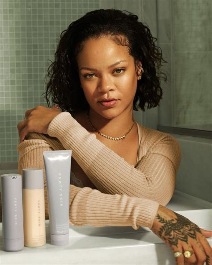Rihanna Stuns In Nearly Sheer Knitted Mini Dress While Doused In Body Oil — Sexy New Pics